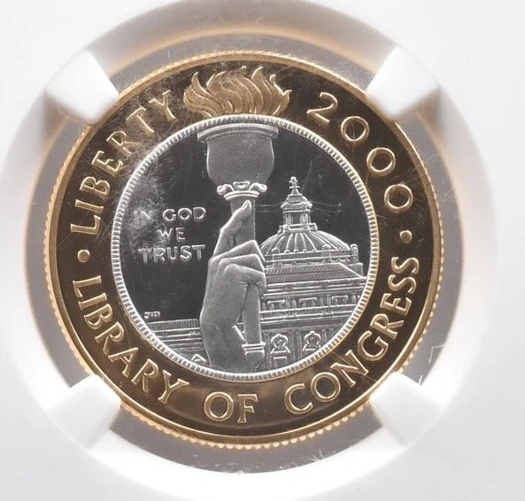 2000-W $10 LIBRARY OF CONGRESS BIMETALLIC COMMEMORATIVE EVERHART: 2000-W $10 Library Of Congress Bimetallic Commemorative Everhart Grade : PF70 Composition : Gold Denomination : $10 Year : 2000 Country of Origin : None Mint Location : West Point Brand/M
