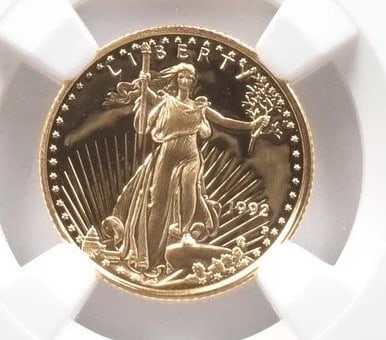 1992-P $5 AMERICAN GOLD EAGLE: 1992-P $5 American Gold Eagle Grade : PF70 Composition : Gold Denomination : $5 Year : 1992 Country of Origin : None Mint Location : Philadelphia Brand/Mint : None Accessories: N