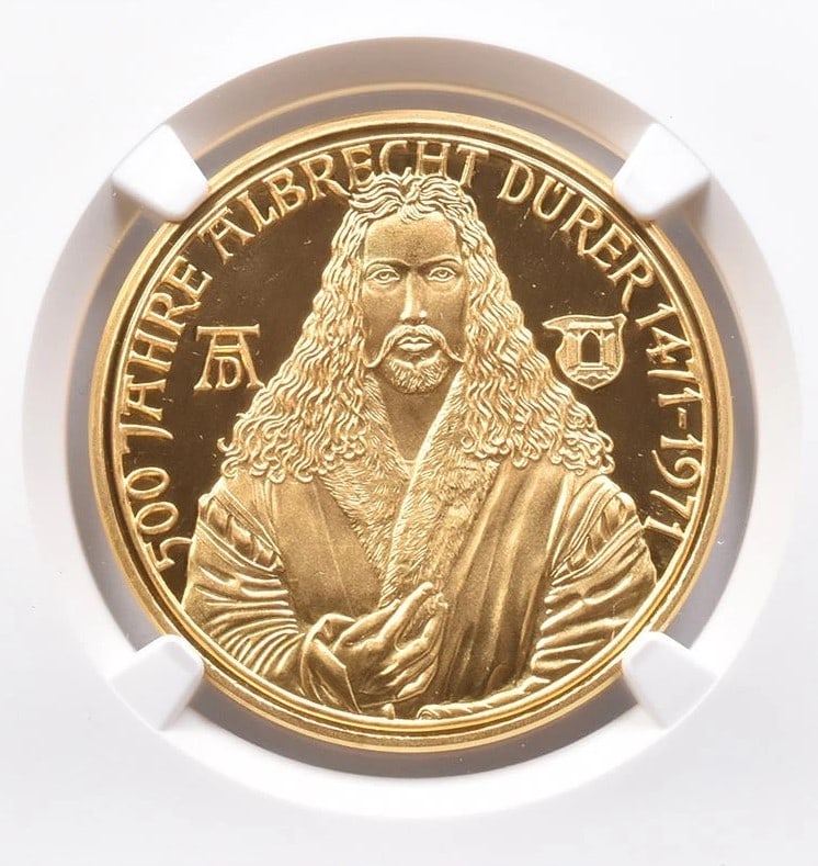 1971 GERMANY GOLD: 1971 Germany Gold Grade : MS69 Composition : Gold Denomination : Not Specified Year : 1971 Country of Origin : None Mint Location : None Brand/Mint : None Accessories: None Accessories