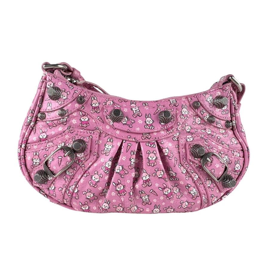 BALENCIAGA BUNNY NEW YEAR LE CAGOLE MINI SHOULDER BAG: BALENCIAGA Bunny New Year Le Cagole Mini Shoulder Bag Brand: BALENCIAGA Type: Shoulder Bag Material: Leather Color: Pink Size: W:8.3inx H:4.3inx D:1.6in Handle Length:15.7in Shoulder Length: 39.4i