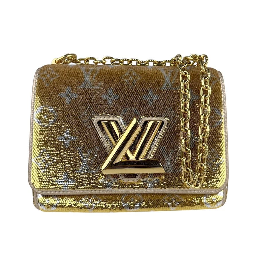 LOUIS VUITTON TWIST PM CHAIN SHOULDER BAG: LOUIS VUITTON Twist PM Chain Shoulder Bag Brand: LOUIS VUITTON Type: Shoulder Bag Material: Sequin Color: Gold / Silver Size: W:7.1inx H:5.9inx D:3.1in Shoulder Length: 47.2in Accessories: None
