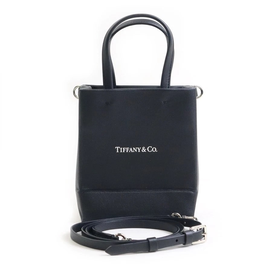 TIFFANY&CO. MINI SHOPPING TOTE SHOULDER BAG HANDBAG: TIFFANY&Co. Mini Shopping Tote Shoulder Bag Handbag Brand: TIFFANY&Co. Type: Shoulder Bag Material: leather Color: Black Size: W:4.7inx H:5.9inx D:3.0in Handle Length:7.5in Shoulder Length: 46.1in