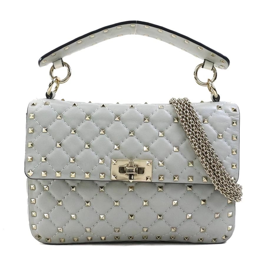 VALENTINO GARAVANI ROCKSTUD HANDBAG SHOULDER BAG: Valentino Garavani Rockstud Handbag Shoulder Bag Brand: Valentino Garavani Type: Handbag Material: Leather x Metal Color: Light Gray/Light Gold Size: W:9.1inx H:6.3inx D:2.4in Handle drop:3.5in Sh