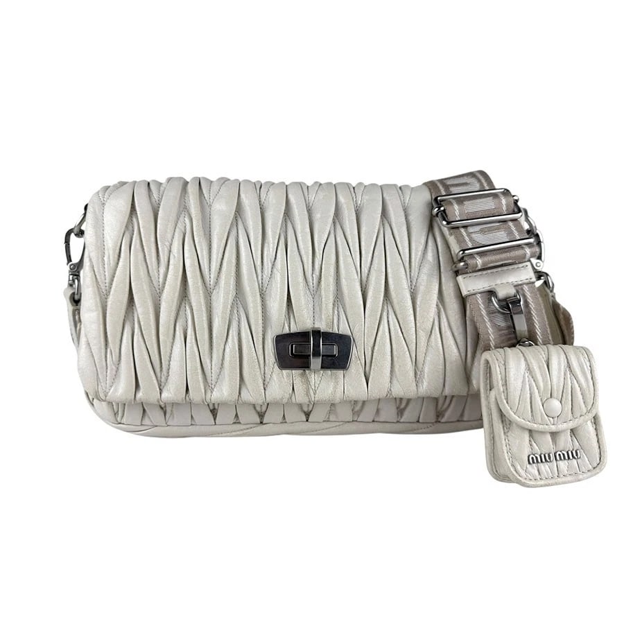 MIUMIU MATELASSE SHOULDER BAG OFF WHITE: MIUMIU Matelasse Shoulder Bag Off White Brand: MIUMIU Type: Shoulder Bag Material: Leather Color: Off White Size: W:10.2inx H:6.3inx D:2.4in Shoulder Length: 44.1in Accessories: None