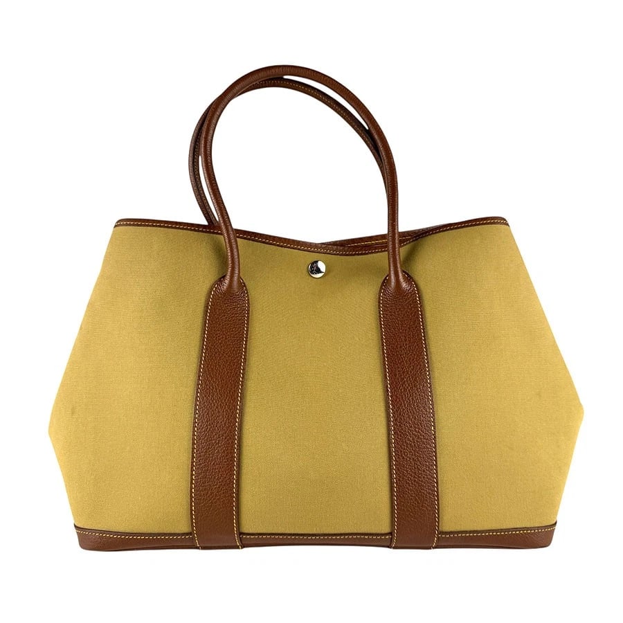 HERMES GARDE PARTY PM HANDBAG BROWN/KHAKI BEIGE: HERMES Garde Party PM Handbag Brown/Khaki Beige Brand: HERMES Type: Handbag Material: Towar Officier x Negonda Color: Brown X Khaki Beige Size: W:14.2inx H:10.2inx D:6.7in Handle Length:17.3in Ac