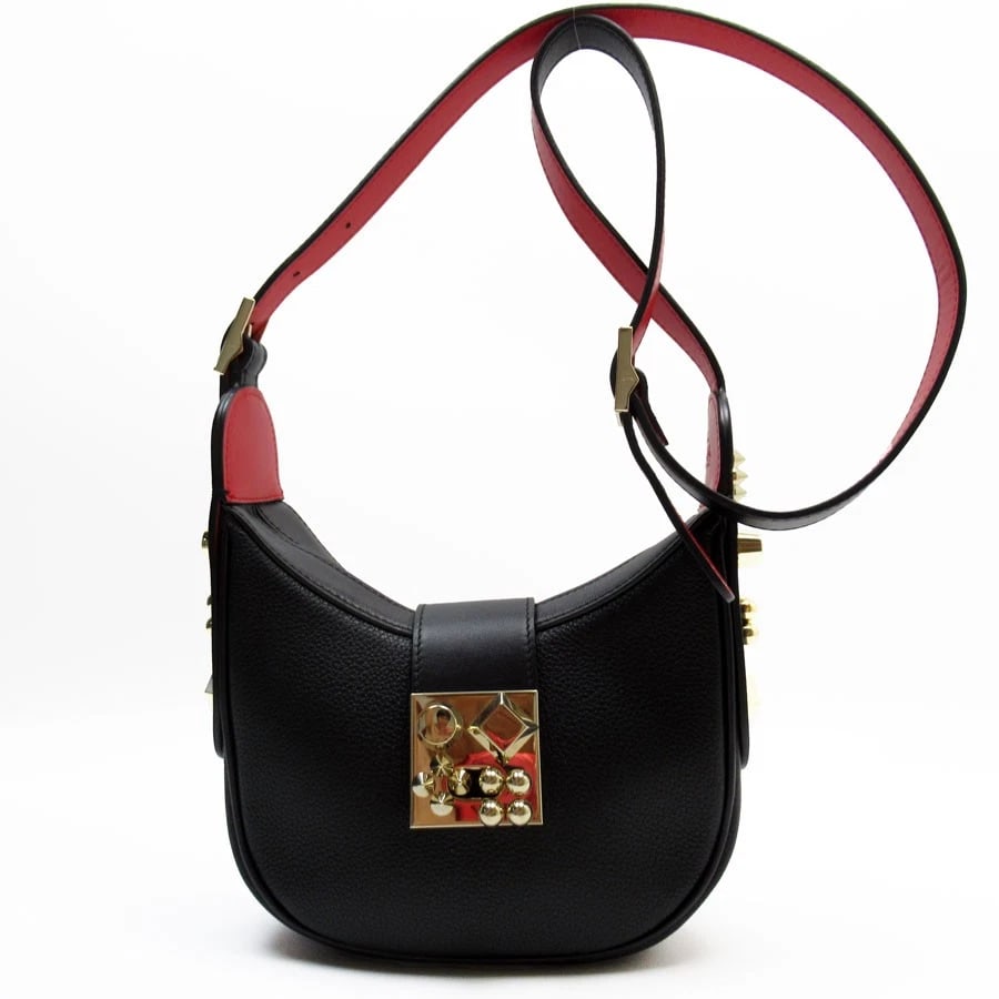CHRISTIAN LOUBOUTIN SHOULDER BAG BLACK: Christian Louboutin Shoulder Bag Black Brand: Christian Louboutin Type: Shoulder Bag Material: leather Color: Black X Red Size: W:7.9inx H:5.1inx D:2.4in Shoulder Length: 44.5in Accessories: None