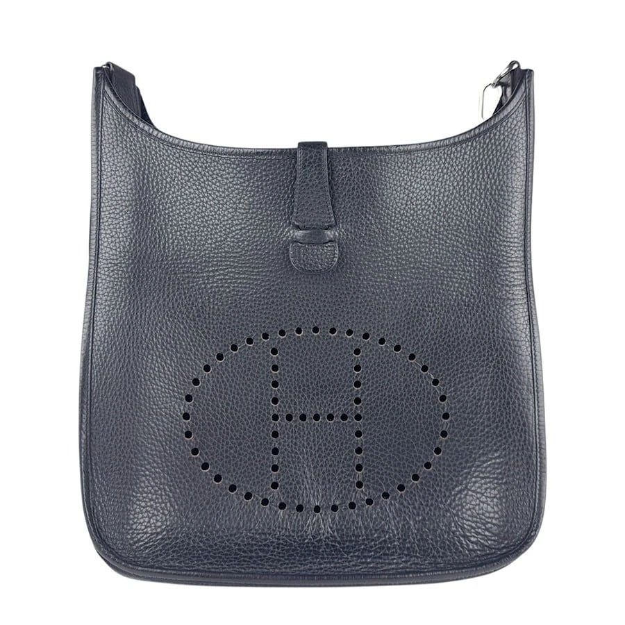 HERMES EVELYNE I GM SHOULDER BAG BLACK TOGO: HERMES Evelyne I GM Shoulder Bag Black Togo Brand: HERMES Type: Shoulder Bag Material: Togo Color: Black Size: W:12.2inx H:11.4inx D:3.1in Shoulder Length: 33.1in Accessories: None Accesso