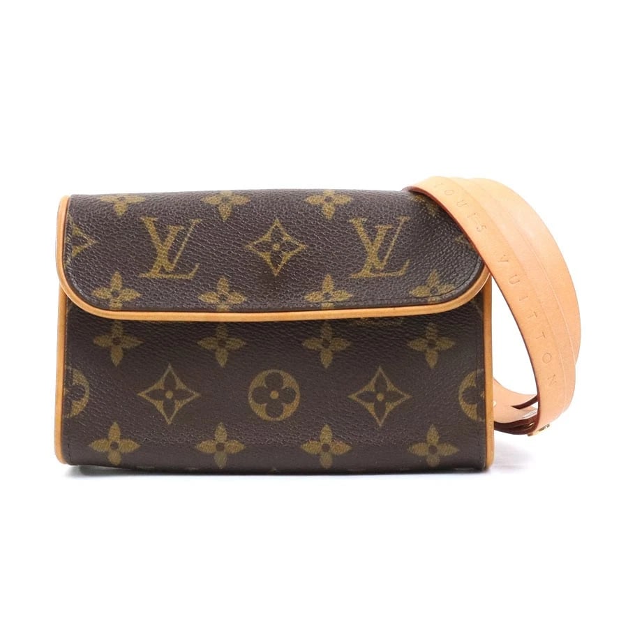 LOUIS VUITTON MONOGRAM POCHETTE FLORENTINE WAIST BAG: LOUIS VUITTON Monogram Pochette Florentine Waist Bag Brand: LOUIS VUITTON Type: Waist bag Material: Monogram canvas Color: Brown Size: W:6.3inx H:4.3inx D:1.4in Shoulder Length: 29.9in Accessorie