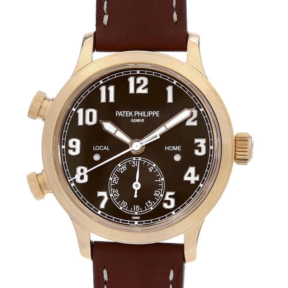 PATEK PHILIPPE CALATRAVA PILOT TRAVEL WATCH: PATEK PHILIPPE Calatrava Pilot Travel Watch Brand: PATEK PHILIPPE Type: Wrist watch Material: Band Material Calfskin, Case Material Rose Gold Color: Dial Color Brown Size: Band Size NONE, Case Siz