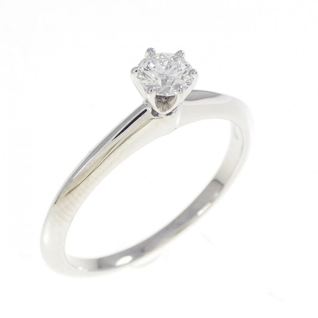 TIFFANY CLASSIC SOLITAIRE RING: Tiffany Classic Solitaire Ring Brand: Tiffany Type: Ring Material: Platinum 950 Main Stone Natural Color: Platinum Size: 7.5 (US size) Accessories: None Accessories Notice: When purchasing