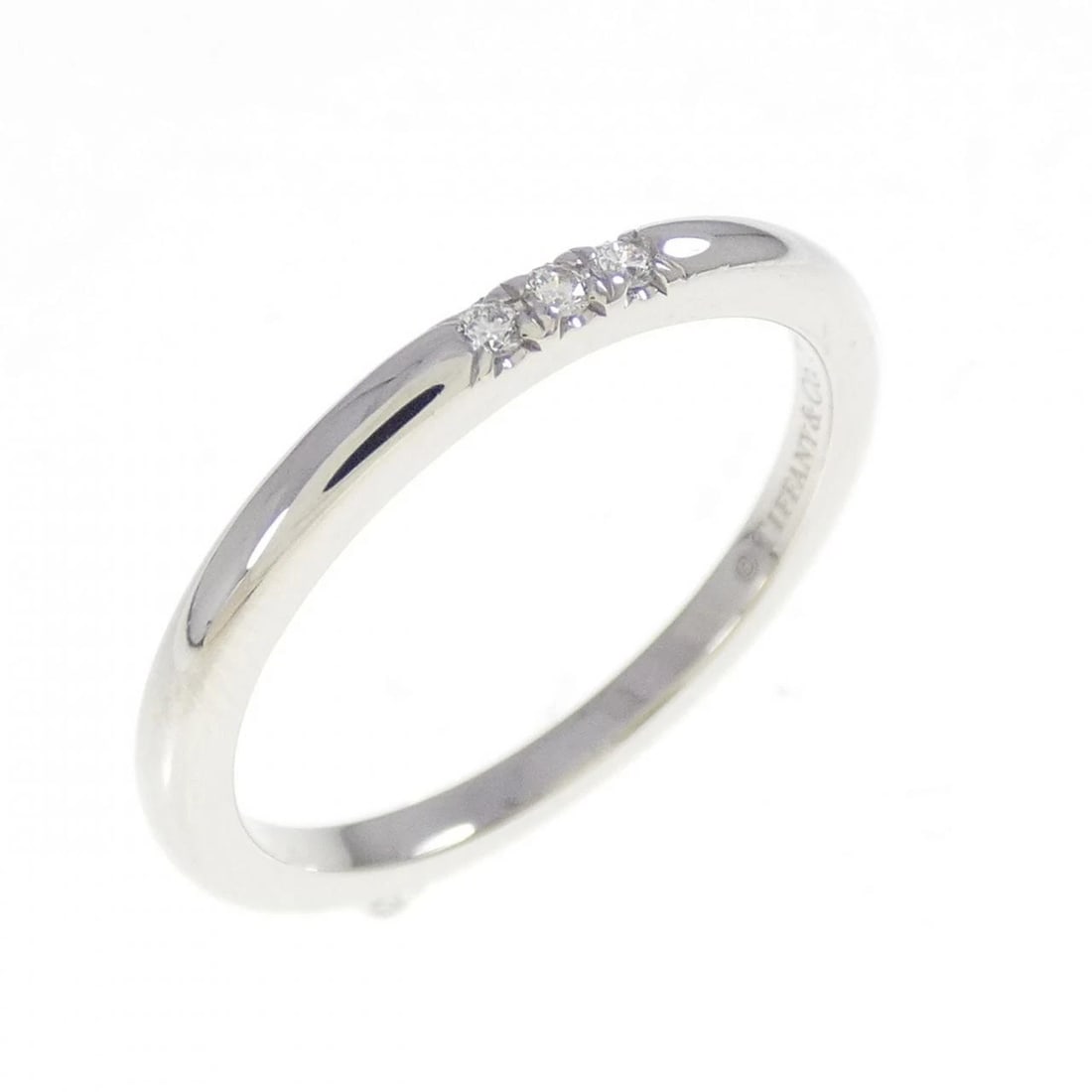 TIFFANY & CO. BAND RING: Tiffany & Co. band Ring Brand: Tiffany Type: Ring Material: Platinum 950 Main Stone Natural Color: Platinum Size: 5.5 (US size) Accessories: None Accessories Notice: When purchasing pre-ow