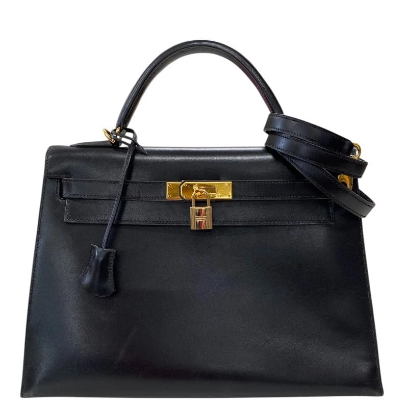 HERMES KELLY 32 INTERNAL SEWING HANDBAG: HERMES Kelly 32 internal sewing Handbag Brand: HERMES Type: Handbag Material: Box scarf Color: Black Gold Hardware Size: W12.6 x H9.1x D4.3inch Shoulder:35.4inch Accessories: None Accessor