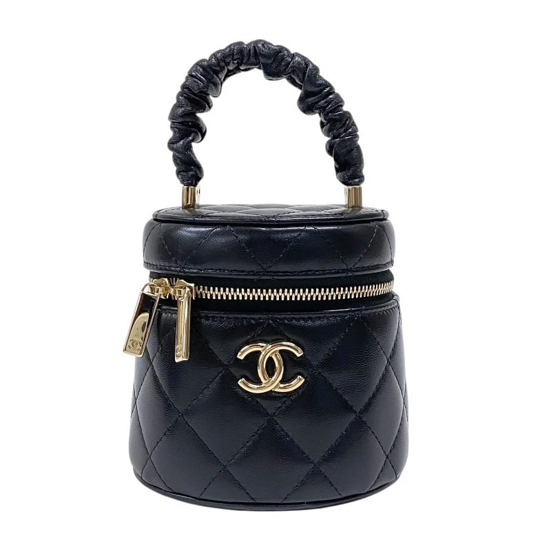 CHANEL MINI VANITY CASE HANDBAG: CHANEL mini vanity case Handbag Brand: CHANEL Type: Handbag Material: lambskin Color: Black Gold Hardware Size: W4.3 x H3.9x D3.5inch Accessories: None Accessories Notice: When purchasing