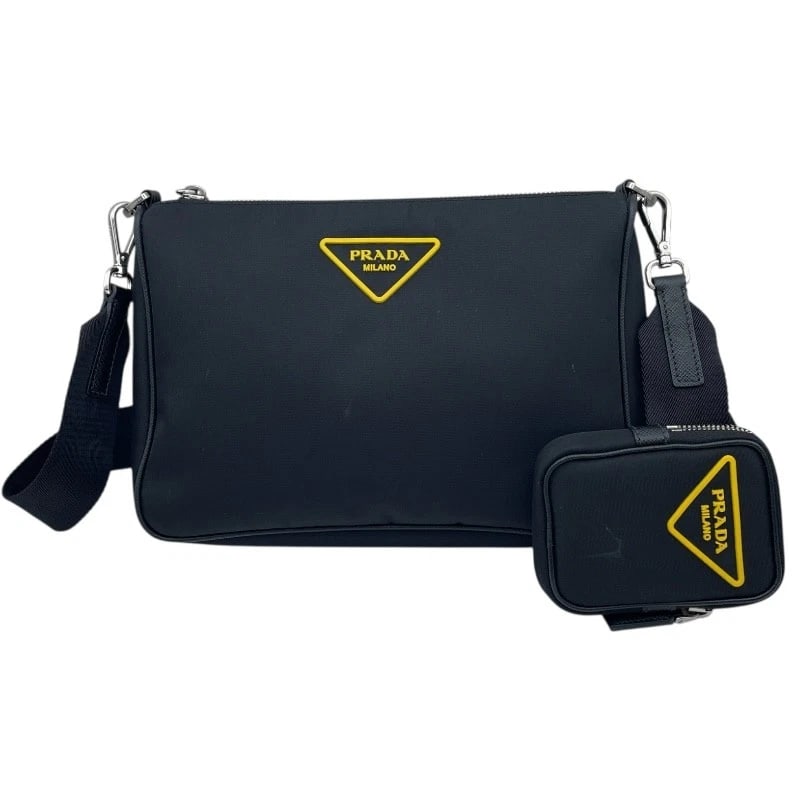 PRADA RE-NYLON SAFFIANO SHOULDER BAG: PRADA Re-Nylon Saffiano Shoulder Bag Brand: PRADA Type: Shoulder Bag Material: Nylon Color: black Size: W9.6 x H6.7x D2.6inch Shoulder:39.8inch Accessories: None Accessories Notice: When p