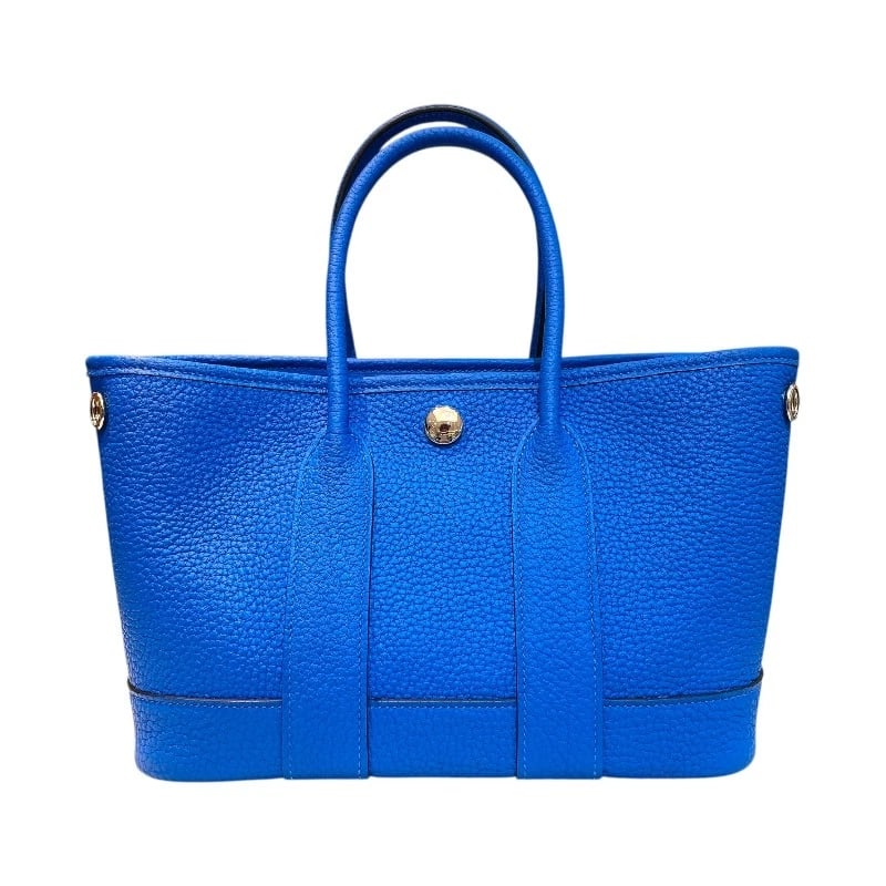 HERMES NEO GARDEN 23 W TIME HANDBAG: HERMES Neo Garden 23 W Time Handbag Brand: HERMES Type: Handbag Material: Negonda Color: Blue Hydra Size: W9.8 x H5.9x D4.7inch Accessories: None Accessories Notice: When purchasing pre-ow