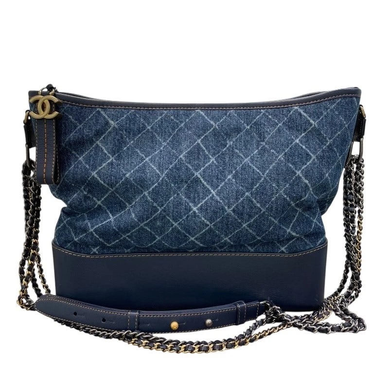 CHANEL GABRIEL DE CHANEL HOBO LARGE SHOULDER BAG: CHANEL Gabriel de Chanel Hobo Large Shoulder Bag Brand: CHANEL Type: Shoulder Bag Material: Denim / leather Color: Blue x navy Size: W12.2 x H10.2x D3.9inch Shoulder:53.1inch Accessories: None