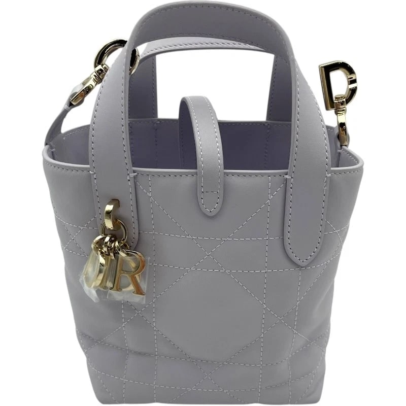 CHRISTIAN DIOR DIOR TOUJOURS VERTICAL NANO TOTE BAG: Christian Dior Dior Toujours Vertical Nano Tote Bag Brand: Christian Dior Type: Tote Bag Material: Calfskin Color: purple Size: W5.1 x H5.9x D5.1inch Accessories: None Accessories Notice: