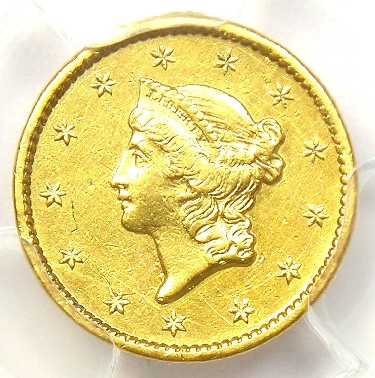 1854-S LIBERTY GOLD DOLLAR G$1 COIN: 1854-S Liberty Gold Dollar G$1 Coin Composition: Gold Year: 1854 Denomination: $1 Fineness: 0.9 Country of Origin: United States Accessories: None Accessories Notice: When purchasing pre-o