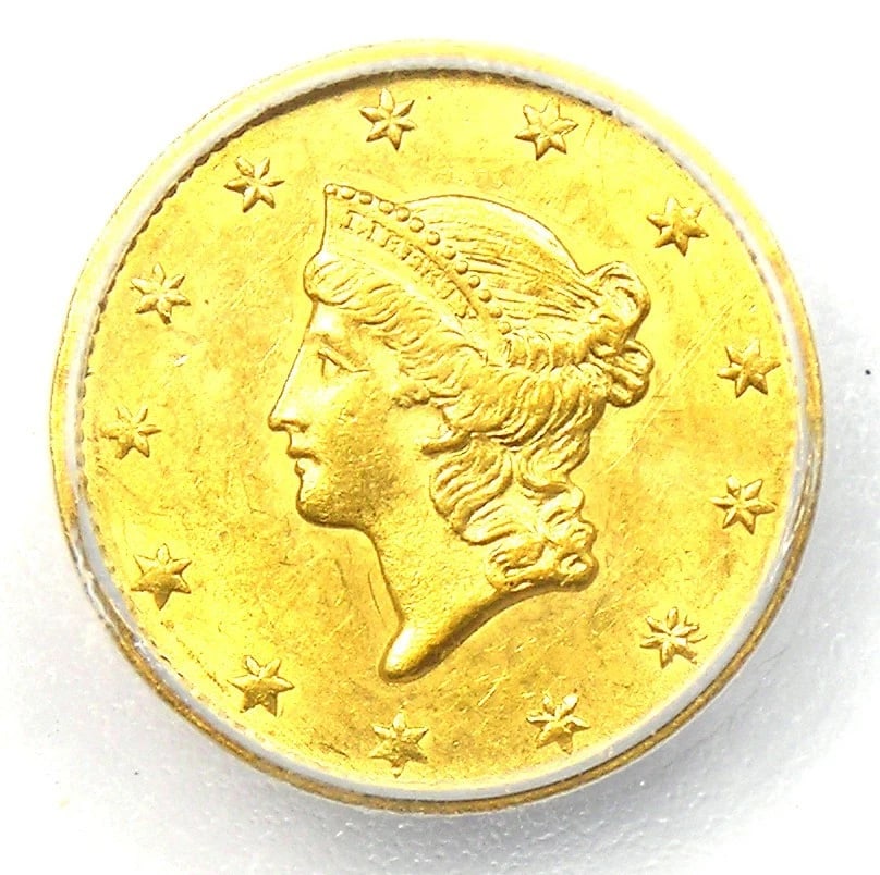 1849 LIBERTY GOLD DOLLAR G$1 COIN: 1849 Liberty Gold Dollar G$1 Coin Composition: Gold Year: 1849 Denomination: $1 Fineness: 0.9 Country of Origin: United States Accessories: None Accessories Notice: When purchasing pre-own