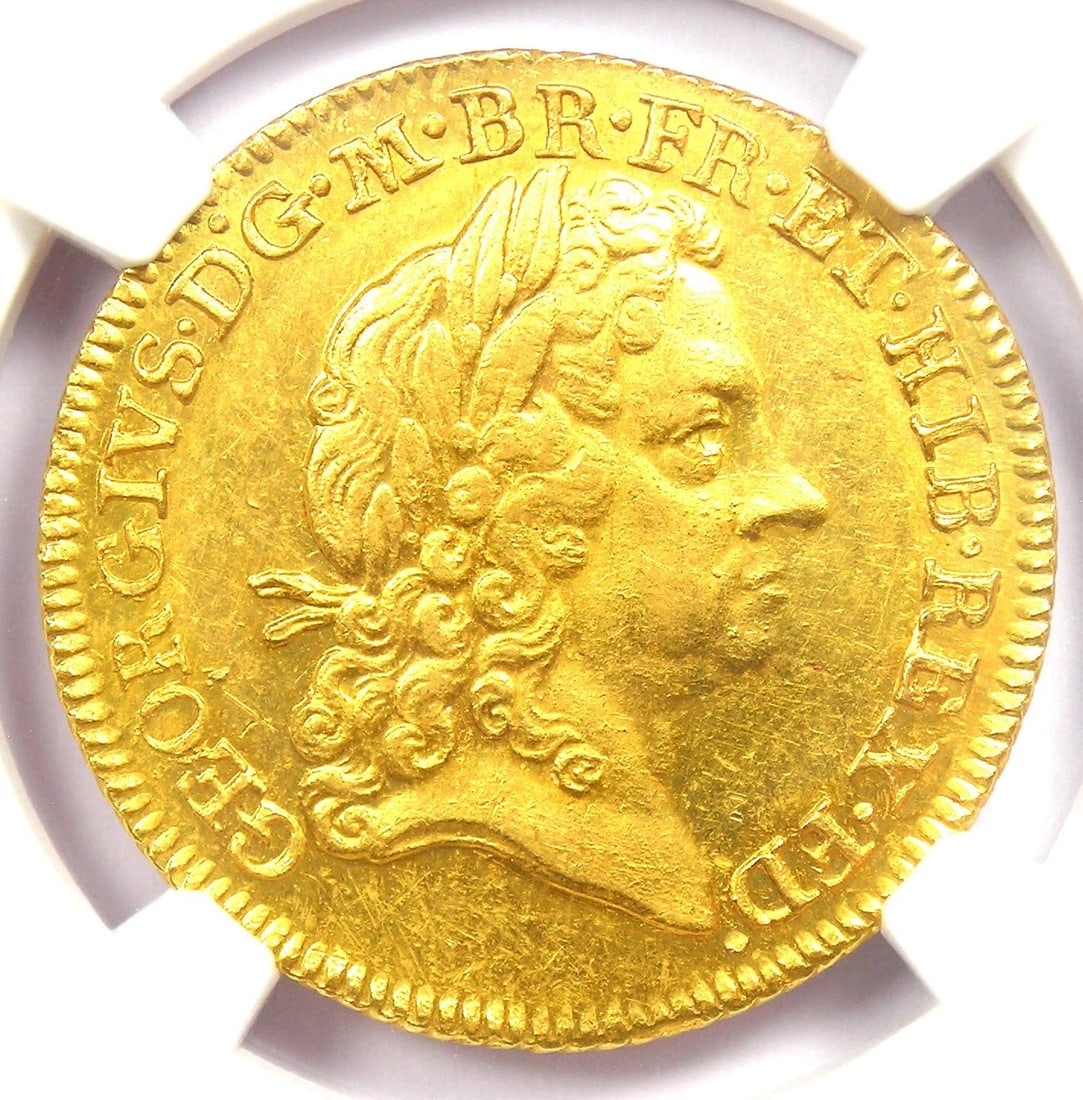 1715 BRITAIN ENGLAND GEORGE GOLD GUINEA COIN: 1715 Britain England George Gold Guinea Coin Composition: Gold Year: 1715 Denomination: Guinea Fineness: None Country of Origin: None Accessories: None Accessories Notice: When purchasing