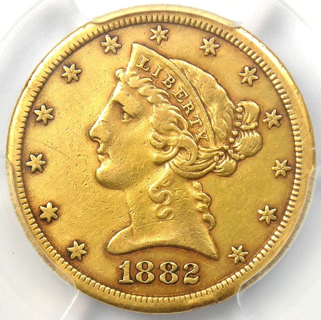 1882-CC LIBERTY GOLD HALF EAGLE $5 COIN: 1882-CC Liberty Gold Half Eagle $5 Coin Composition: Gold Year: 1882 Denomination: $5 Fineness: 0.9 Country of Origin: United States Accessories: None Accessories Notice: When purchasing p