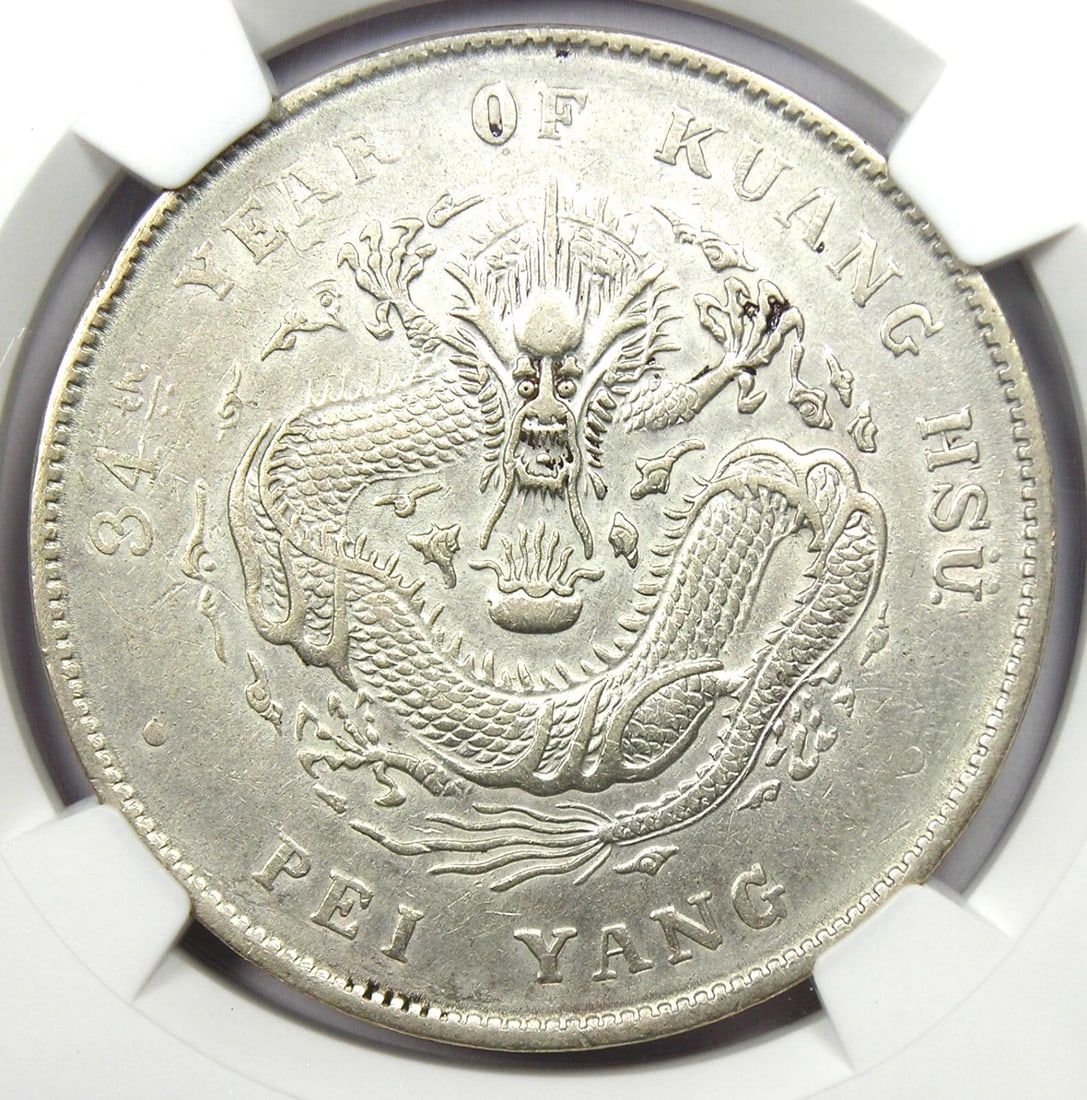 1908 CHINA CHIHLI DRAGON SILVER DOLLAR $1 COIN: 1908 China Chihli Dragon Silver Dollar $1 Coin Composition: Silver Year: 1908 Denomination: $1 Fineness: None Country of Origin: China Accessories: None Accessories Notice: When purchasing