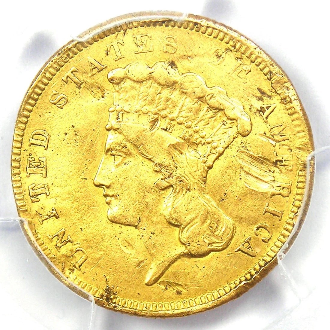 1854-O THREE DOLLAR INDIAN GOLD NEW ORLEANS COIN: 1854-O Three Dollar Indian Gold New Orleans Coin Composition: Gold Year: 1854 Denomination: $3 Fineness: None Country of Origin: United States Accessories: None Accessories Notice: When pu