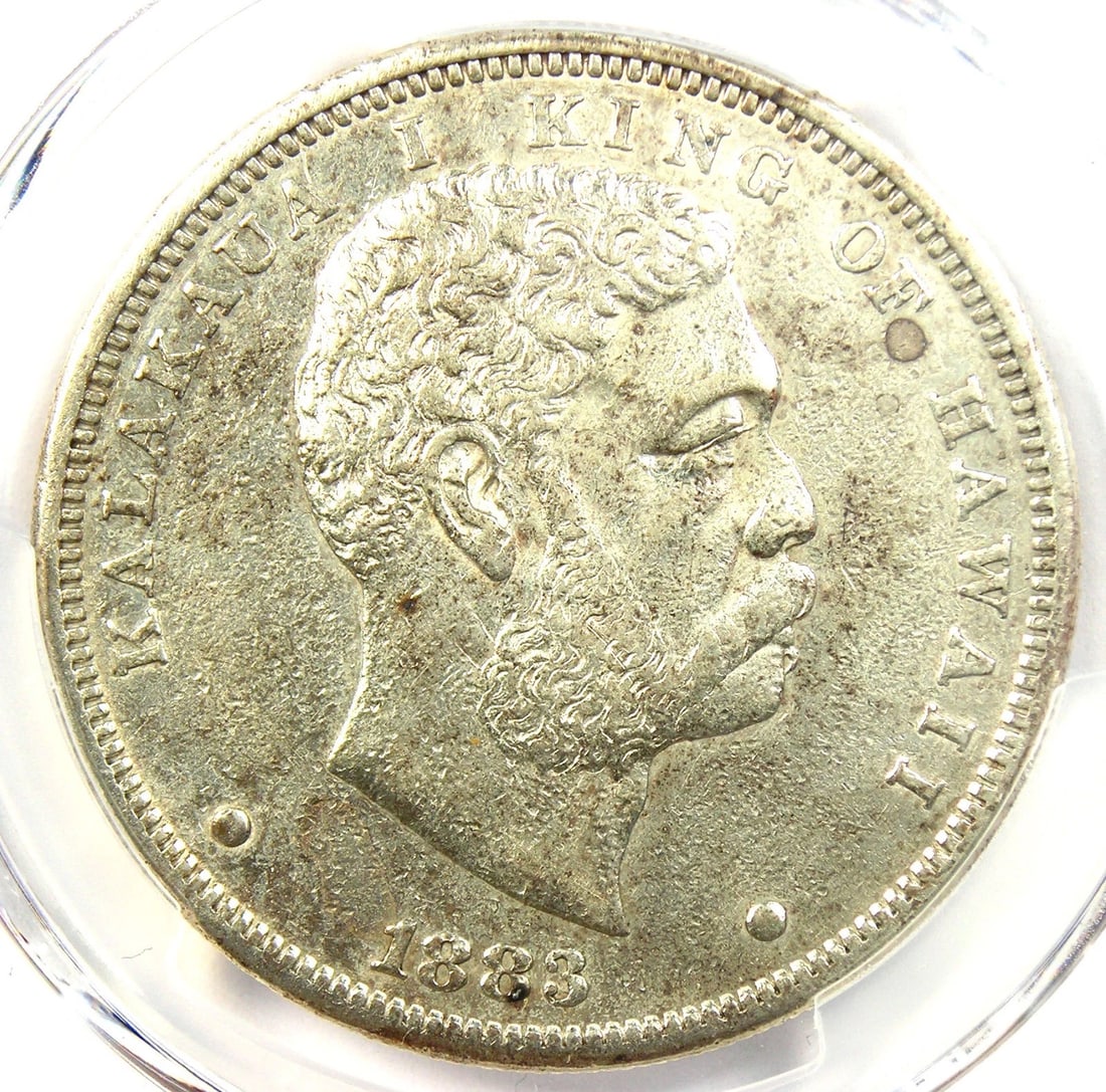 1883 HAWAII KALAKAUA DOLLAR $1 SILVER COIN: 1883 Hawaii Kalakaua Dollar $1 Silver Coin Composition: Silver Year: 1883 Denomination: $1 Fineness: 0.9 Country of Origin: United States Accessories: None Accessories Notice: When purchas