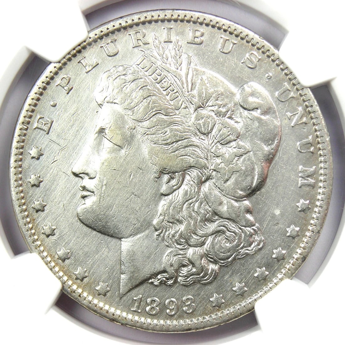 1893 MORGAN SILVER DOLLAR $1 COIN: 1893 Morgan Silver Dollar $1 Coin Composition: Silver Year: 1893 Denomination: $1 Fineness: 0.9 Country of Origin: United States Accessories: None Accessories Notice: When purchasing pre-o
