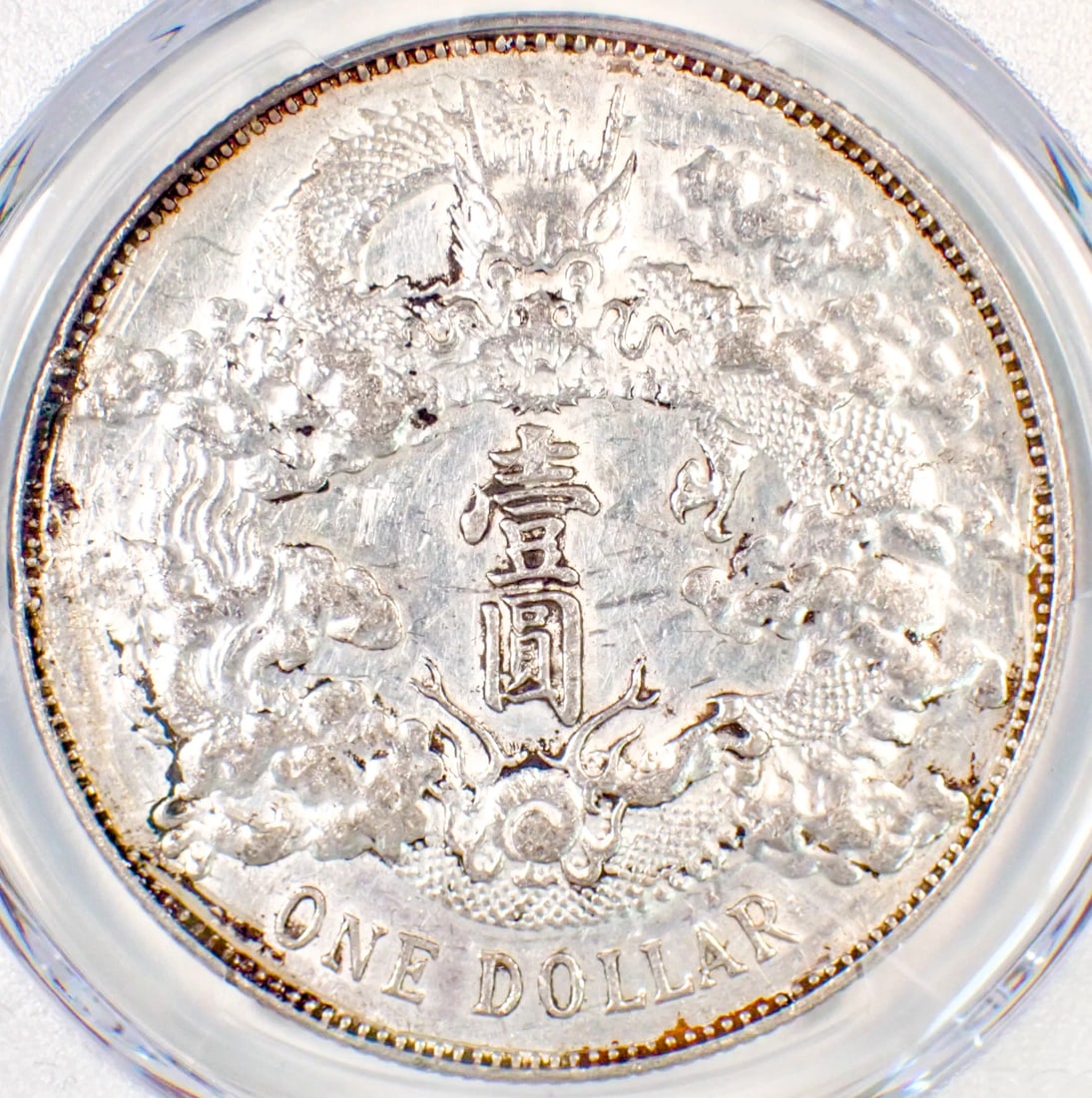 1911 CHINA EMPIRE DRAGON SILVER DOLLAR $1: 1911 China Empire Dragon Silver Dollar $1 Composition: Silver Year: 1911 Denomination: $1 Fineness: None Country of Origin: China Accessories: None Accessories Notice: When purchasing pre-