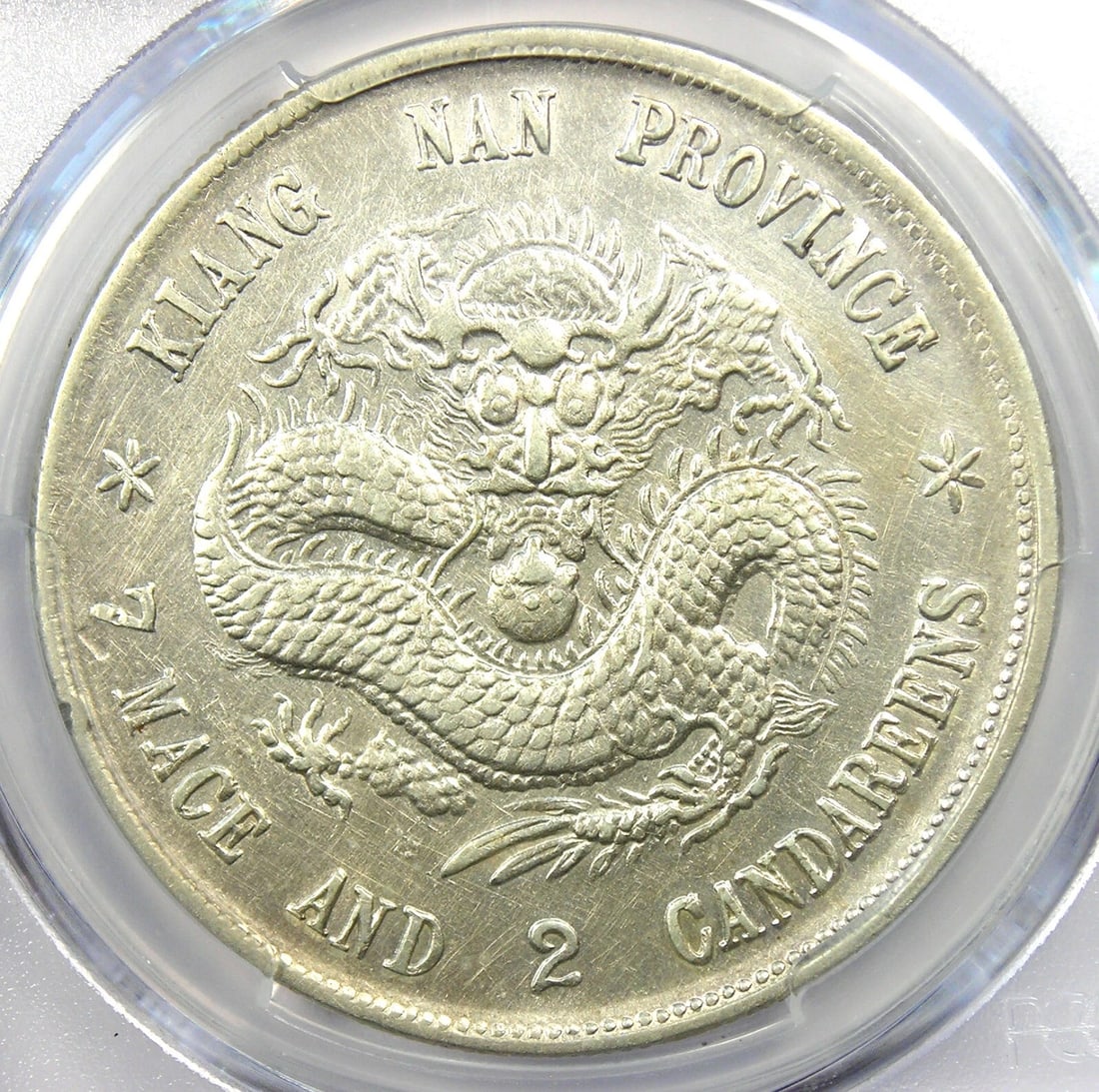 1899 CHINA KIANGNAN DRAGON SILVER DOLLAR $1 COIN: 1899 China Kiangnan Dragon Silver Dollar $1 Coin Composition: Silver Year: 1899 Denomination: $1 Fineness: None Country of Origin: China Accessories: None Accessories Notice: When purchasi