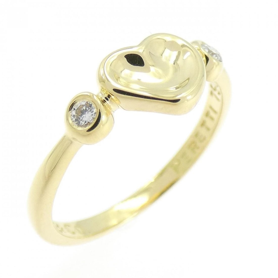 TIFFANY CLOSED HEART RING: Tiffany Closed Heart Ring Brand: Tiffany Type: Ring Material: 750 Yellow Gold Main Stone Natural Color: Yellow Gold Size: 5-5.5 (US size) Accessories: None Accessories Notice: When purchas