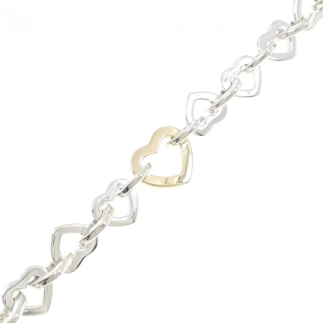 TIFFANY HEART LINK BRACELET: Tiffany Heart Link Bracelet Brand: Tiffany Type: Bracelet Material: 925 Silver 750 Yellow Gold Color: Silver Yellow Gold Size: 18.5cm Max W: 13.5mm Accessories: None Accessories Notice: Wh