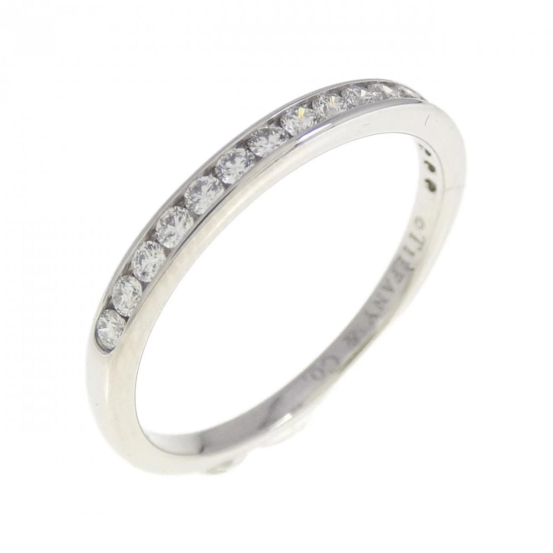 TIFFANY & CO. HALF CIRCLE CHANNEL SETTING RING: Tiffany & Co. half Circle channel setting Ring Brand: Tiffany Type: Ring Material: Platinum 950 Main Stone Natural Color: Platinum Size: 5.5 (US size) Accessories: None Accessories Notice: