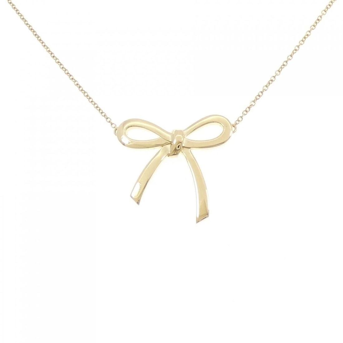 TIFFANY RIBBON MEDIUM NECKLACE: Tiffany Ribbon Medium Necklace Brand: Tiffany Type: Necklace Material: 750 Yellow Gold Color: Yellow Gold Size: 41cm Accessories: None Accessories Notice: When purchasing pre-owned goods,