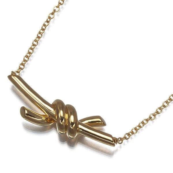TIFFANY&CO. NECKLACE KNOT SMALL 18K 750 YELLOW GOLD: Tiffany&Co. Necklace Knot Small 18K 750 Yellow Gold Brand: Tiffany & Co. Type: Necklace Material: 18K / 750 / Yellow Gold Color: Yellow Gold Size: Necklace length: 38 / 43cm Pendant size: 7.2