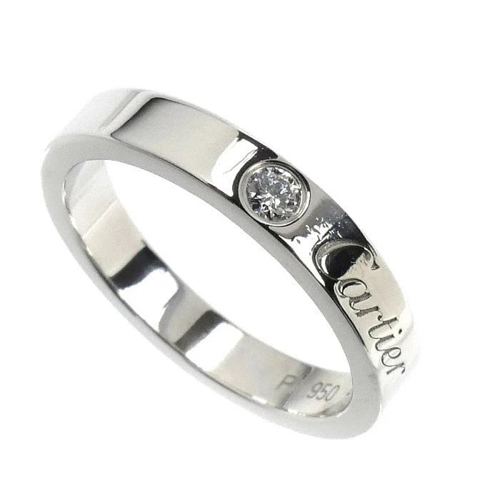 CARTIER ENGRAVED 1P DIAMOND RING PT950: Cartier Engraved 1P Diamond Ring Pt950 Brand: Cartier Type: Ring Material: Platinum Main Stone/Creation Natural Color: Silver Size: 3.75 US Accessories: None Accessories Notice: When purch
