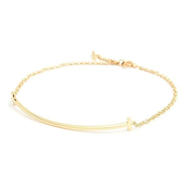 TIFFANY & CO. T SMILE BRACELET 18K YELLOW GOLD: Tiffany & Co. T Smile Bracelet 18K Yellow Gold Brand: Tiffany & Co. Type: Bracelet Material: 18K Yellow Gold Color: Yellow Gold Size: Bracelet Length: approx. 6.5 in (16.5 cm) Recommended Wrist Si