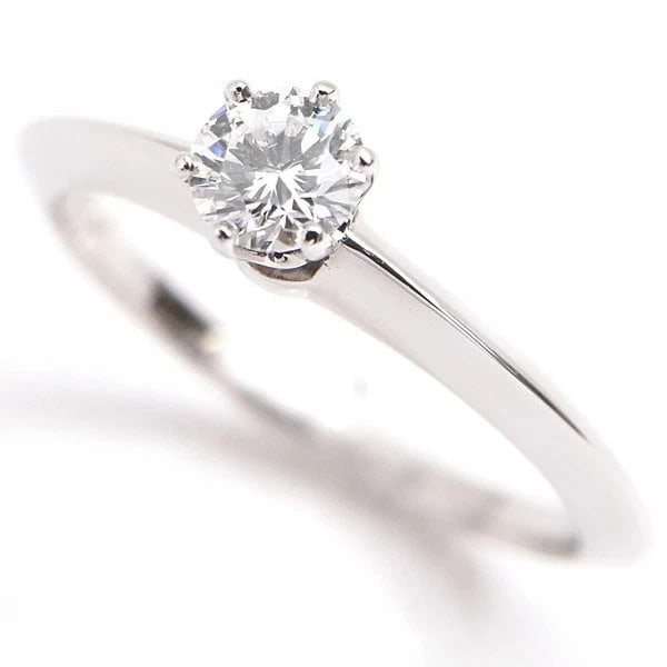 TIFFANY SOLITAIRE DIAMOND RING PT950: Tiffany Solitaire Diamond Ring PT950 Brand: Tiffany & Co. Type: Ring Material: Platinum Main Stone/Creation Natural Color: Silver Size: 4.5 US Accessories: None Accessories Notice: When pu