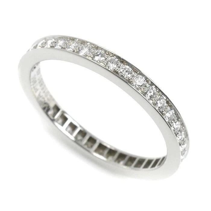 VAN CLEEF & ARPELS ROMANCE ETERNITY RING: Van Cleef & Arpels Romance Eternity Ring Brand: Van Cleef & Arpels Type: Ring Material: Platinum Main Stone/Creation Natural Color: Silver Size: 4.75-5 US Accessories: None Accessories Not