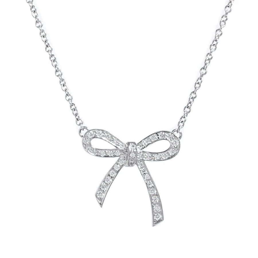 TIFFANY & CO. DIAMOND BOW NECKLACE PT950 PLATINUM: Tiffany & Co. Diamond Bow Necklace Pt950 Platinum Brand: Tiffany & Co. Type: Necklace Material: Platinum Main Stone/Creation Natural Color: Silver Size: Chain Length: Approx. 16.1 inches Pendant S
