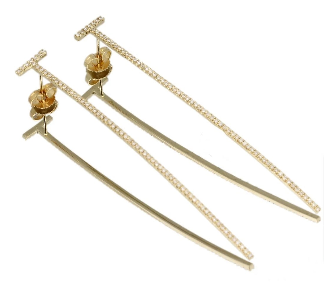 TIFFANY & CO. T SMILE BAR LONG EARRINGS AFTER DIAMOND: Tiffany & Co. T Smile Bar Long Earrings After Diamond Brand: Tiffany & Co. Type: Drop/Dangle Earrings Material: 18K Yellow Gold Main Stone/Creation Natural Color: Yellow Gold Size: Dimensions: Len