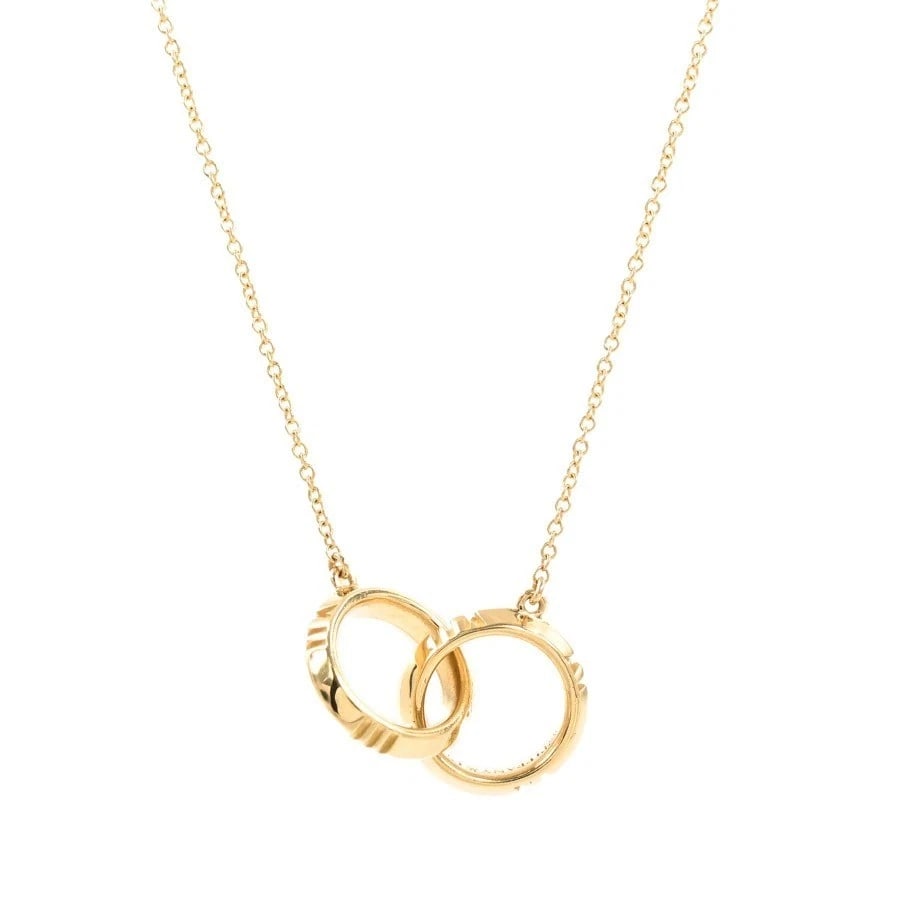 TIFFANY & CO. ATLAS X CLOSED INTERLOCKING NECKLACE 18K YELLOW GOLD: Tiffany & Co. Atlas X Closed Interlocking Necklace 18K Yellow Gold Brand: Tiffany & Co. Type: Necklace Material: 18K Yellow Gold Color: Yellow Gold Size: Chain Length: Approx. 15.9 in / 18.1 in (a