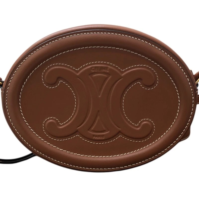 CELINE CROSSBODY OVAL PURSE CUIR TRIOMPHE SHOULDER BAG: CELINE Crossbody Oval Purse Cuir Triomphe Shoulder Bag Brand: CELINE Type: Shoulder Bag Material: Smooth Calfskin Color: Brown Size: W6.1 x H4.5x D1.6inch Shoulder:40.9inch Accessories: None
