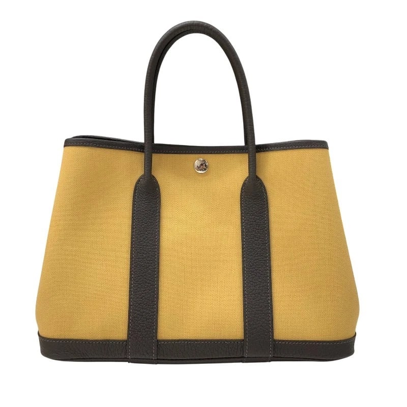 HERMES GARDEN PARTY THANDBAG: HERMES Garden party THandbag Brand: HERMES Type: Handbag Material: Toile Negonda Color: Ginger Ebene SilverHardware Size: W11.4 x H8.3x D5.1inch Accessories: None Accessories Notice: When