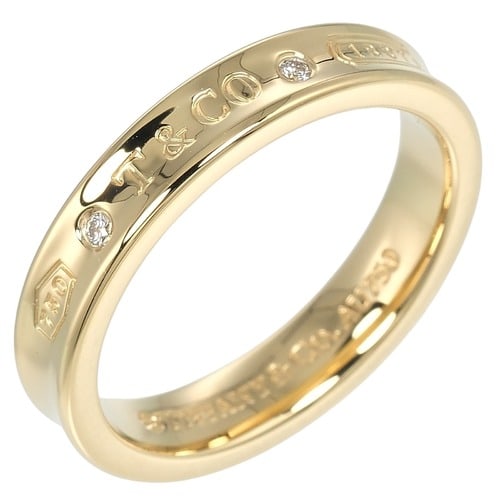 TIFFANY & CO. RING 18K YELLOW GOLD: Tiffany & Co. ring,, 18K Yellow Gold Brand: Tiffany Type: Band ring Material: Yellow gold (18K) Color: Yellow gold Size: 7.5 US Accessories: None Accessories Notice: When purchasing pre-ow