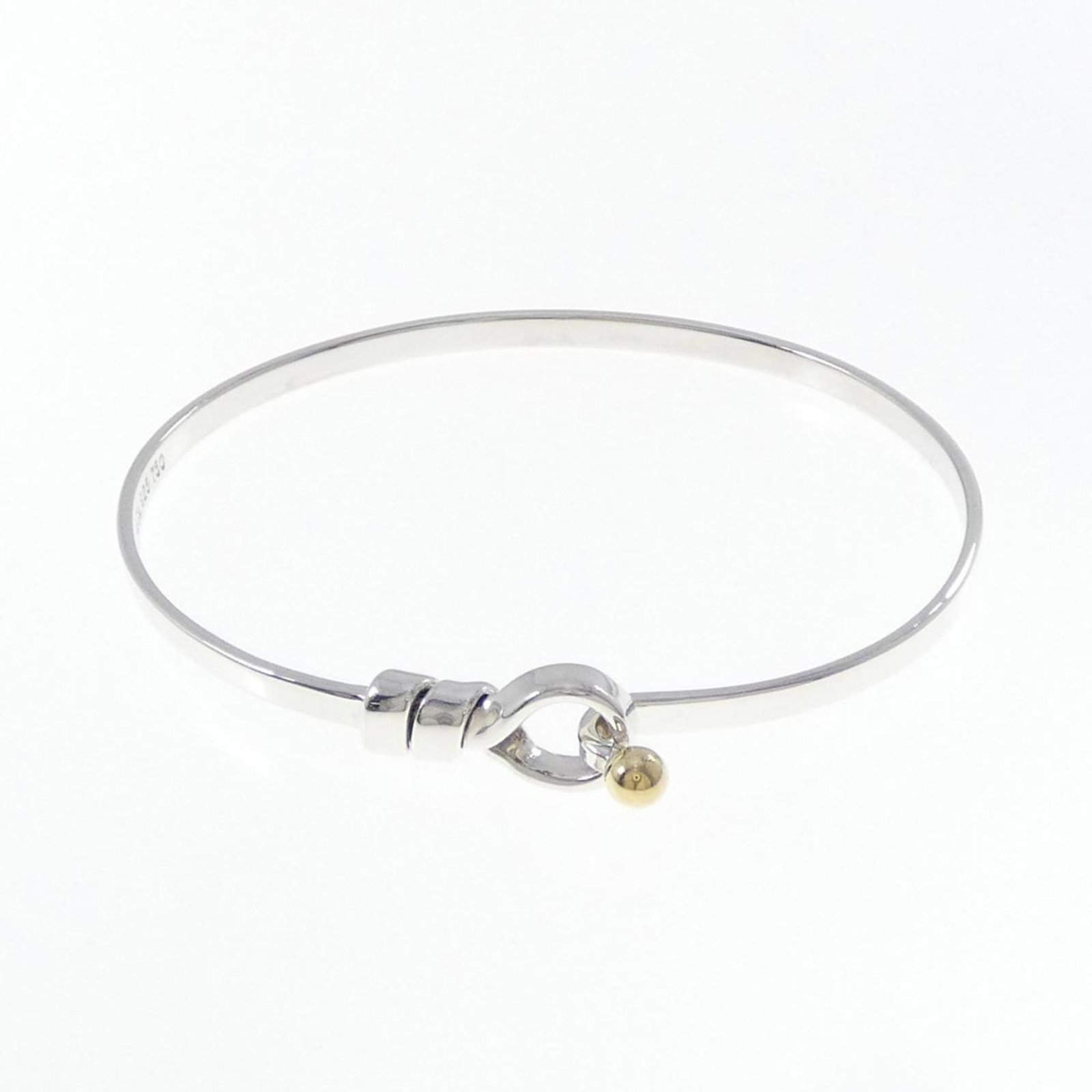 TIFFANY HOOK & EYE BANGLE: TIFFANY Hook & Eye Bangle Brand: Tiffany Type: Necklace Material: Silver 925 Yellow gold (18K) Color: Silver Size: Length 17cm / 6.69'' Accessories: None Accessories Notice: When purchasing