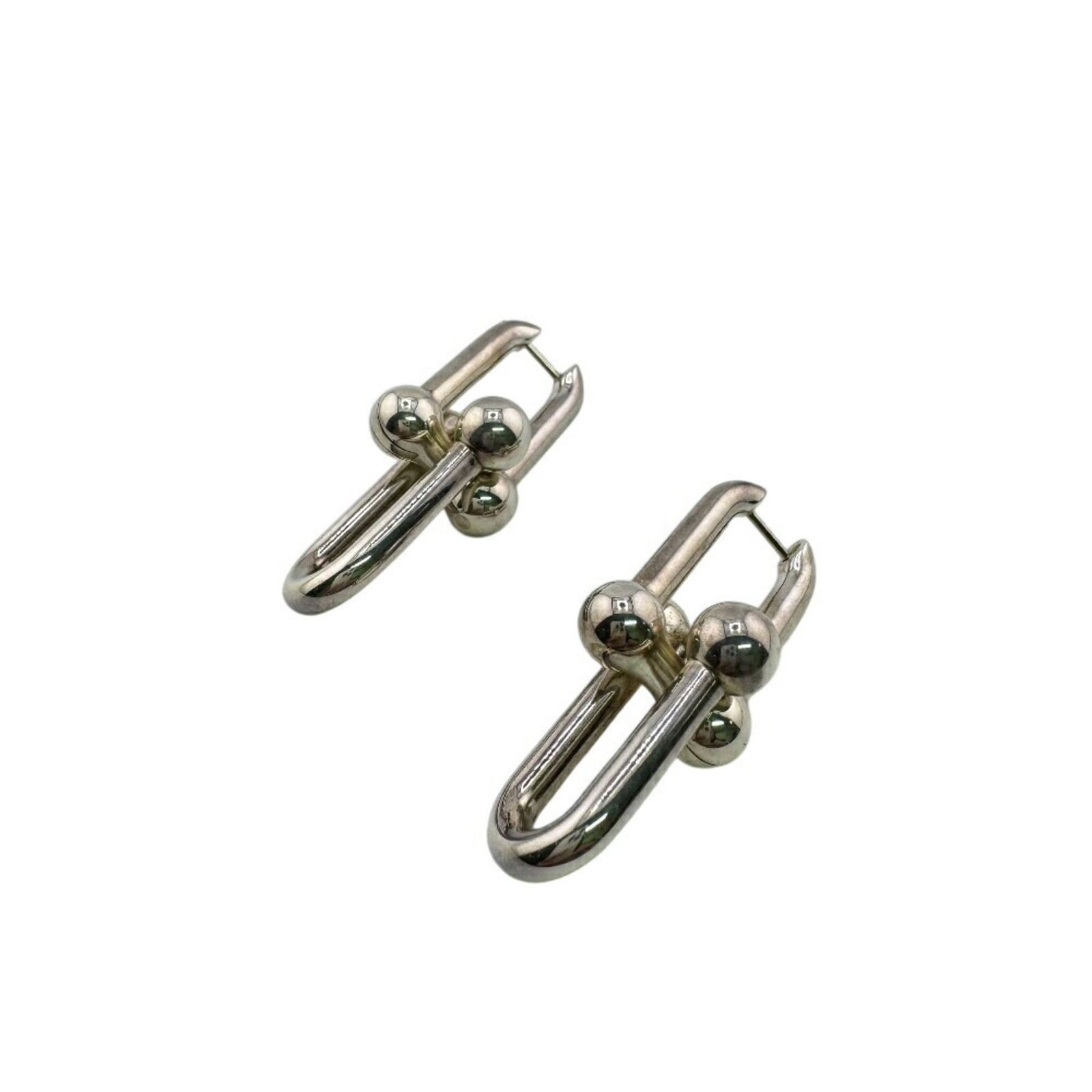 TIFFANY LINK EARRINGS: Tiffany Link Earrings Brand: Tiffany Type: Stud earrings Material: Silver 925 Color: Silver Size: (HxWxD) 45.00mm x 15.00mm / 1.77'' x 0.59'' Accessories: None Accessories Notice: When
