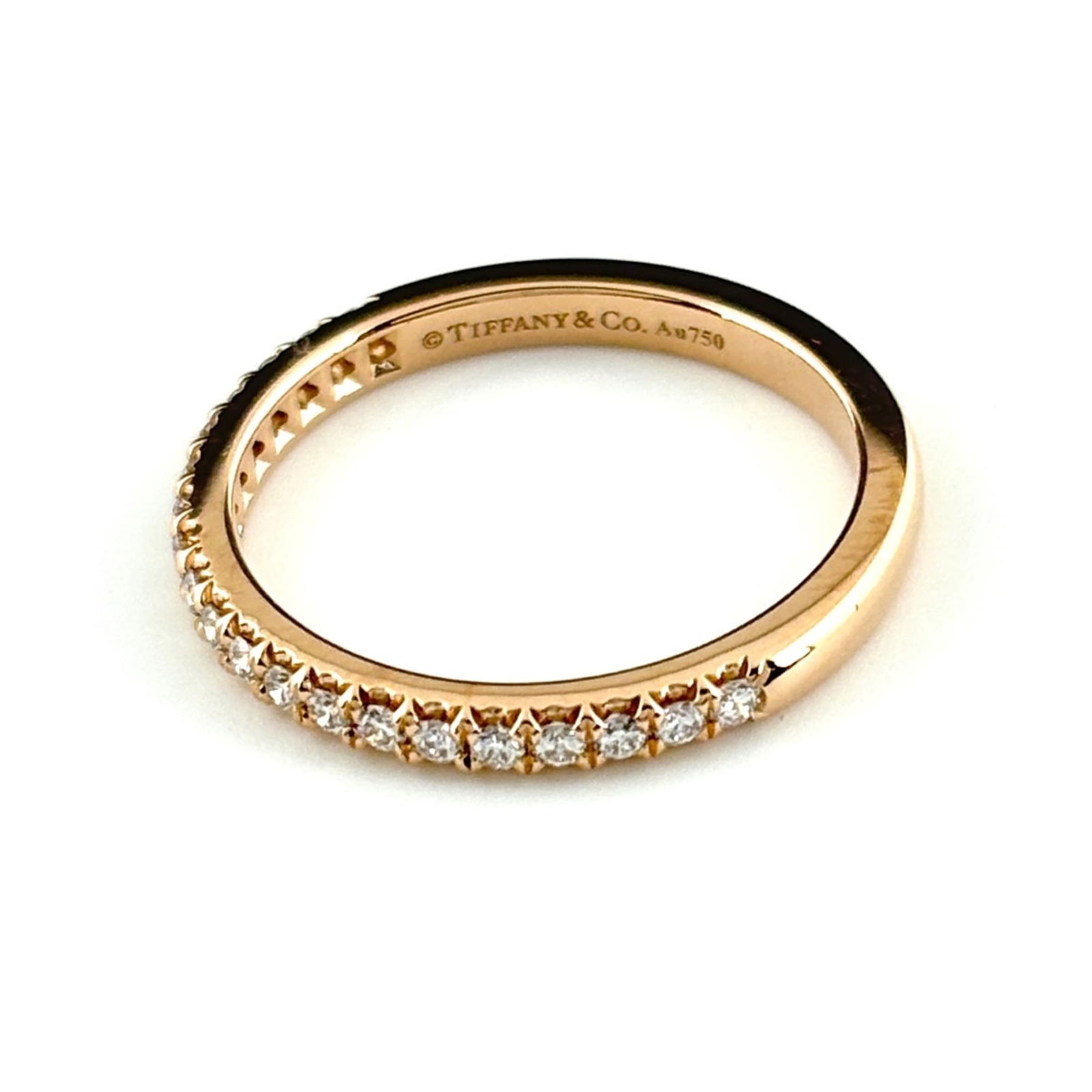 TIFFANY & CO. HALF ETERNITY SOLESTE RING: Tiffany & Co. Half Eternity Soleste Ring Brand: Tiffany Type: Band ring Material: Pink gold Color: None Size: 3.5 US Accessories: None Accessories Notice: When purchasing pre-owned goods,