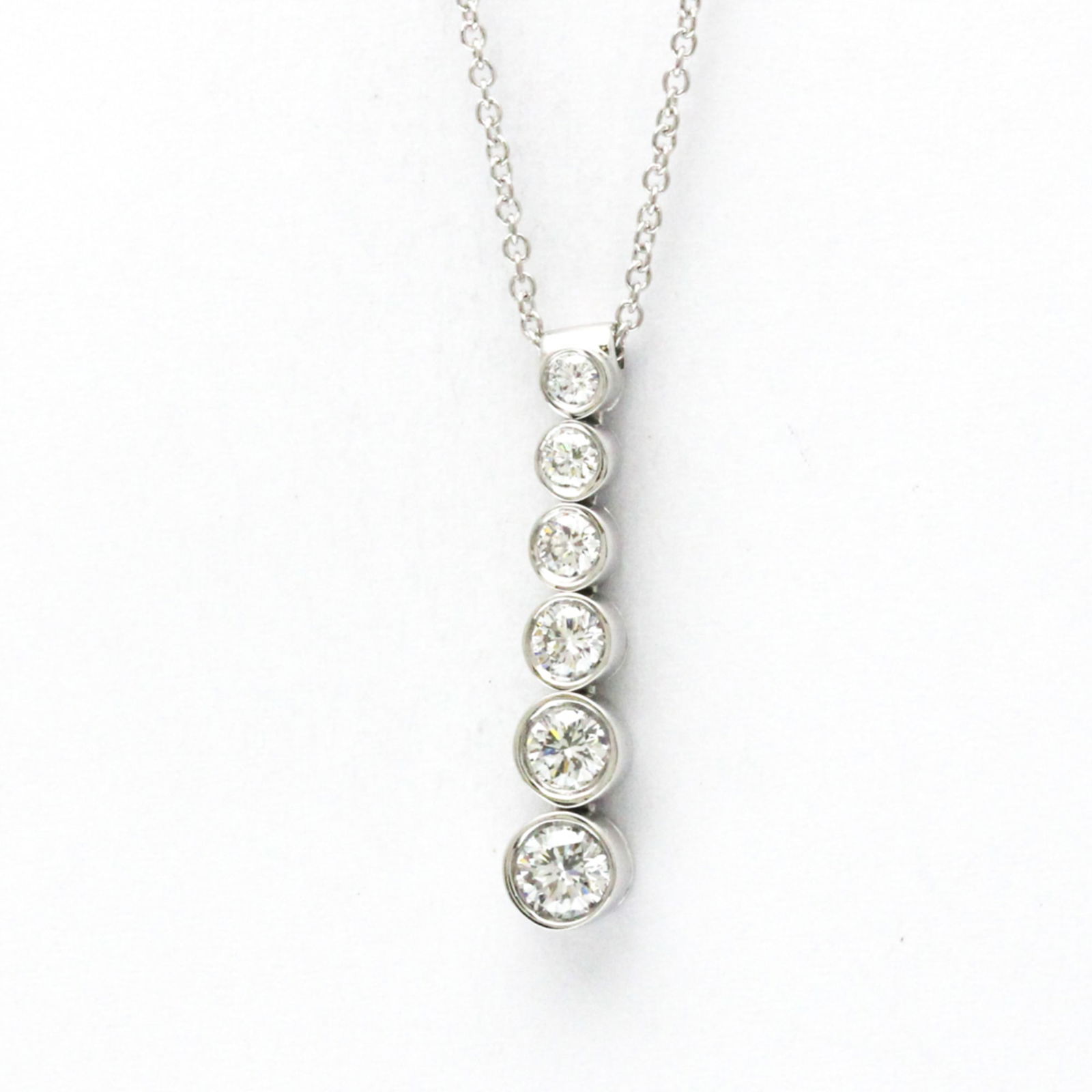 TIFFANY JAZZ GRADUATED NECKLACE PLATINUM DIAMOND: TIFFANY Jazz Graduated Necklace Platinum Diamond Brand: Tiffany Type: Pendant necklace Material: Platinum Color: Silver Size: Neck Circumference 40 cm / 15.74'' Pendant Size 23.2mm x 4.7mm /